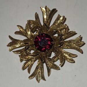 Benedikt NY gold toned Faceted red stone signed floral brooch